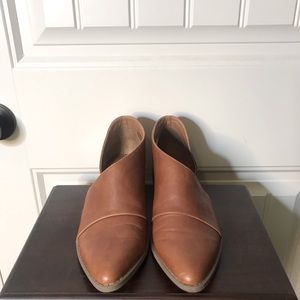Brown flats with open sides